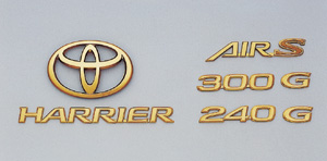 Gold emblem (the Toyota symbol (for rear)) (Car name logograph (for rear)) (Grademark (for rear))