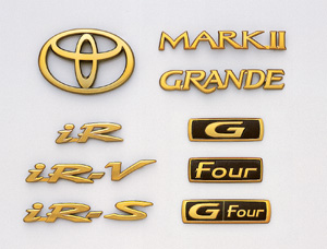 Gold emblem (the Toyota symbol (for rear)) (Car name logograph (for rear) MARK?) [grademark (for rear)] (G) (IR−V) (IR−S) (IR) (GRANDE) [Rear drive] (G−FOUR) (FOUR)