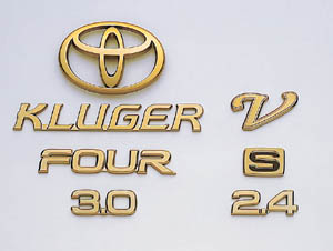 Gold emblem (car name logograph (for rear)) (Aerodynamic volume displacement mark) (rear drive) (the Toyota symbol (for rear))